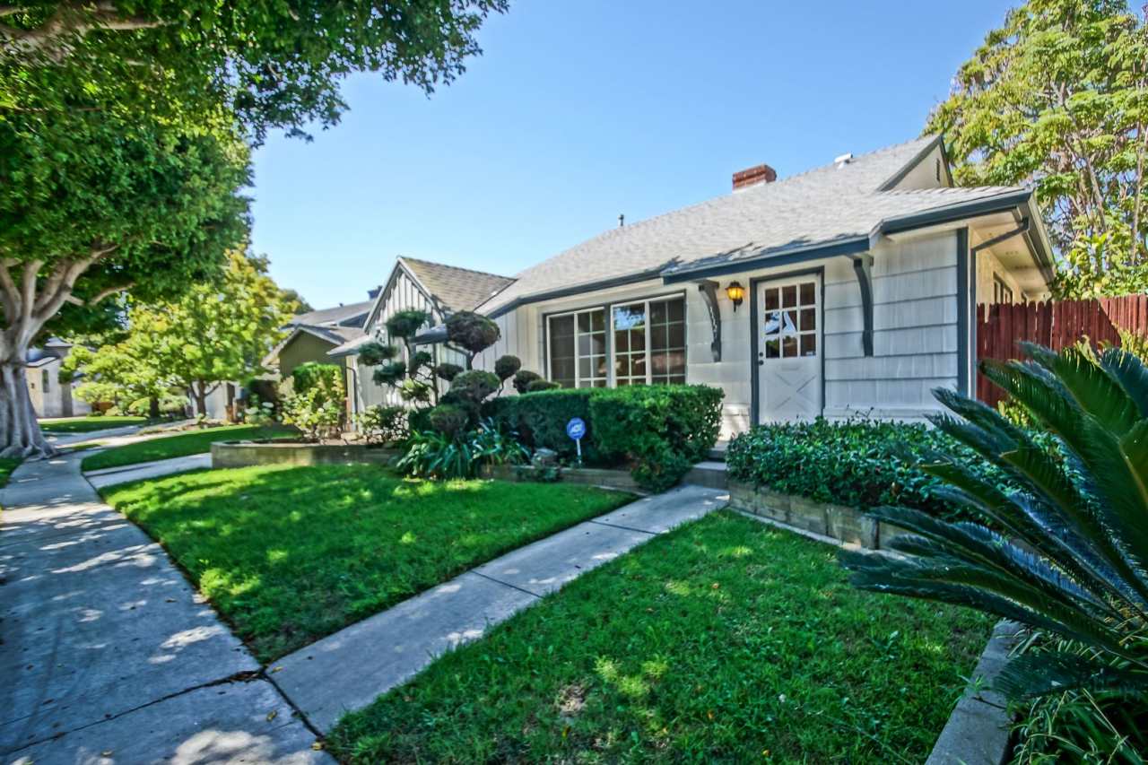 Incredibly Charming  Bright 3BR2BA Home w/ Newly Remodeled Kitchen  Large Laundry Room  Detached 2-Car Garage 1 Block from School!