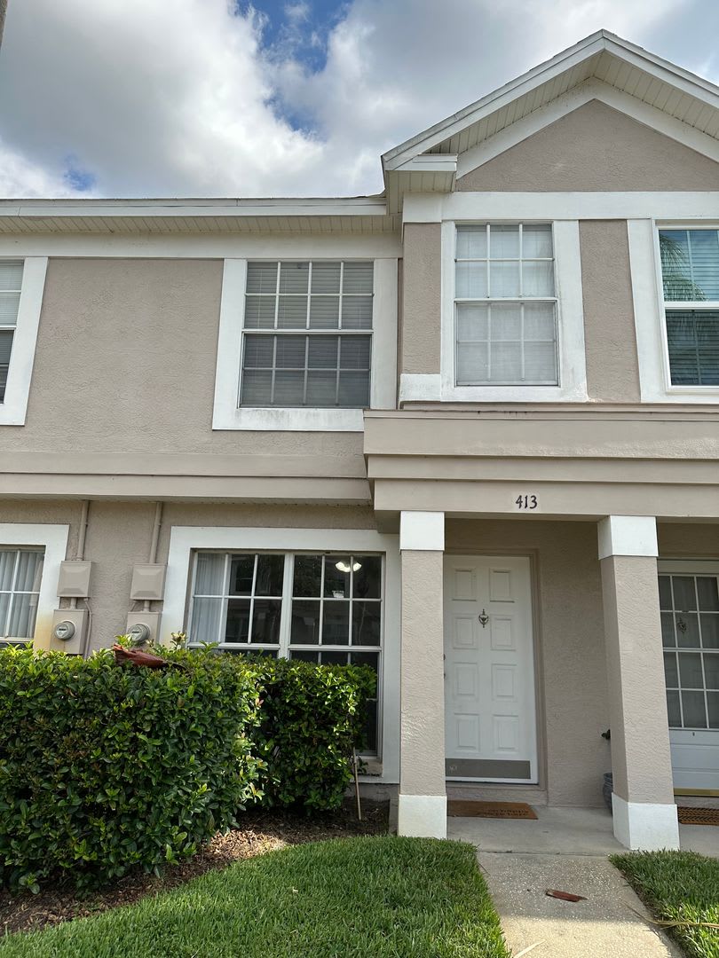 Beautiful Townhome in a gated community with assigned parking spots and a community pool