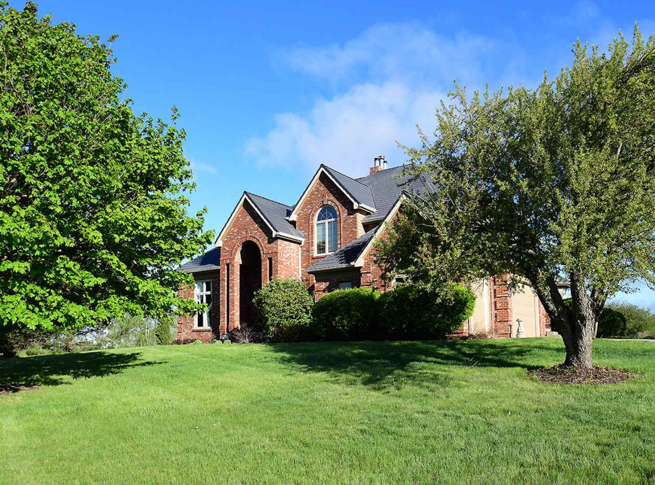 Large Acreage 5/5 with Pond!