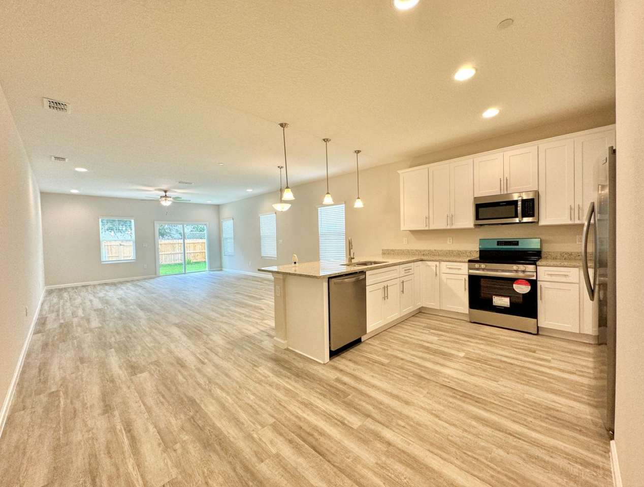 Newer 2024 Beachside Beauty: 4-Bedroom Home with Modern Elegance and Prime Location!