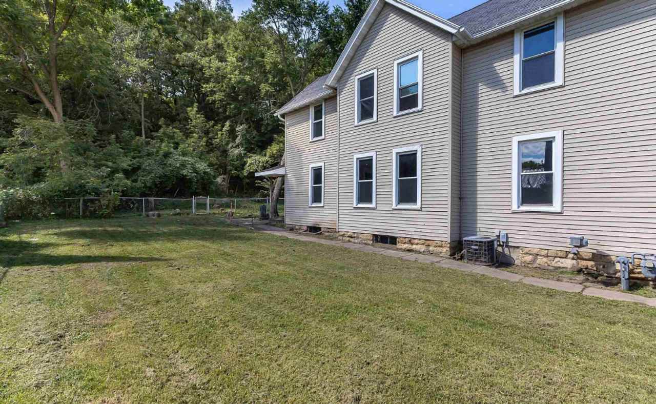 Charming 3-bedroom 1-bathroom single family house rental with a fenced in yard