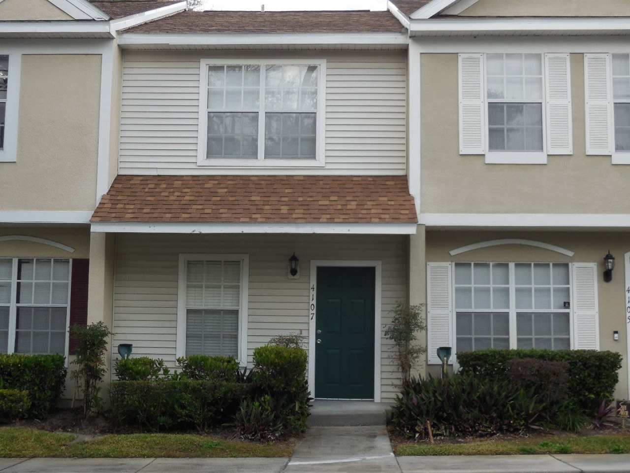 4107 Plantation Cove Dr. Quiet, cozy townhouse with view of the grounds.