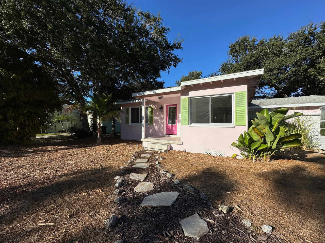 Charming Dunedin Retreat: 2BR Home with Sunroom  Garage!