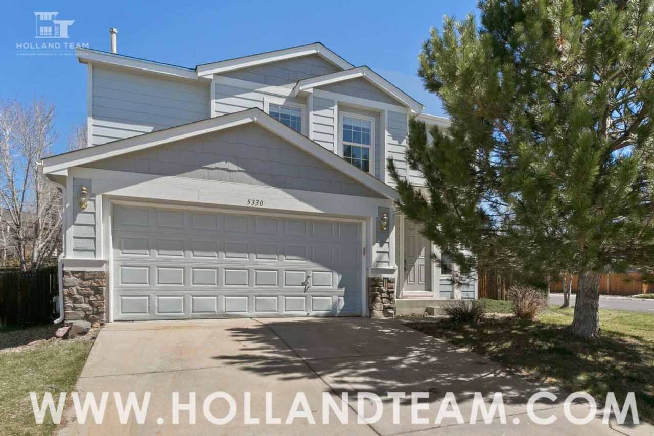 Updated home on large corner lot in Centennial!