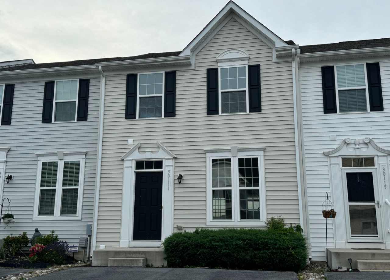 The Homestead- immaculate town home with community pool.