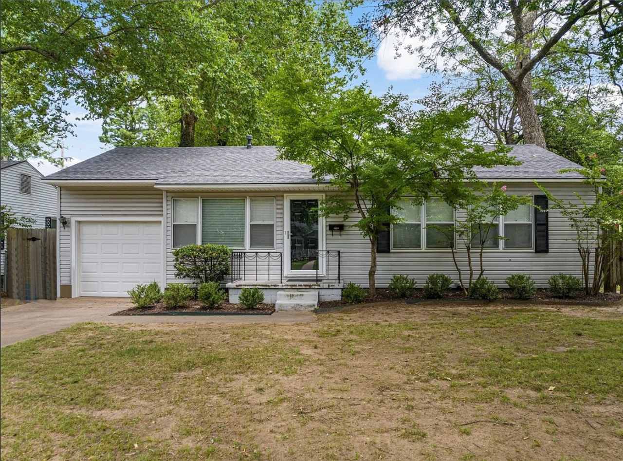 Located in the heart of Brookside, this inviting home sits on a spacious, fully fenced corner lot.