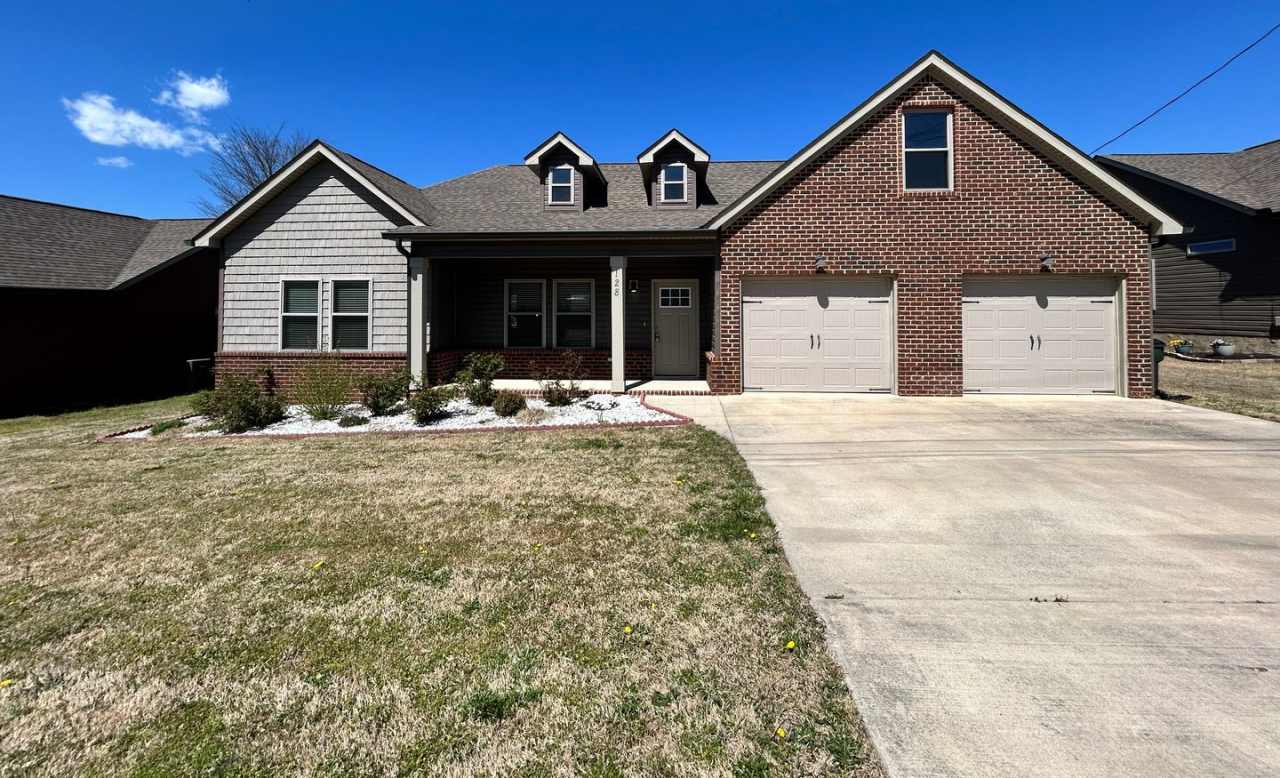 Single Leve 3 Bed, 2 Bath, 2 Car Garage, Oversized Covered Deck in a Charming Neighborhood!