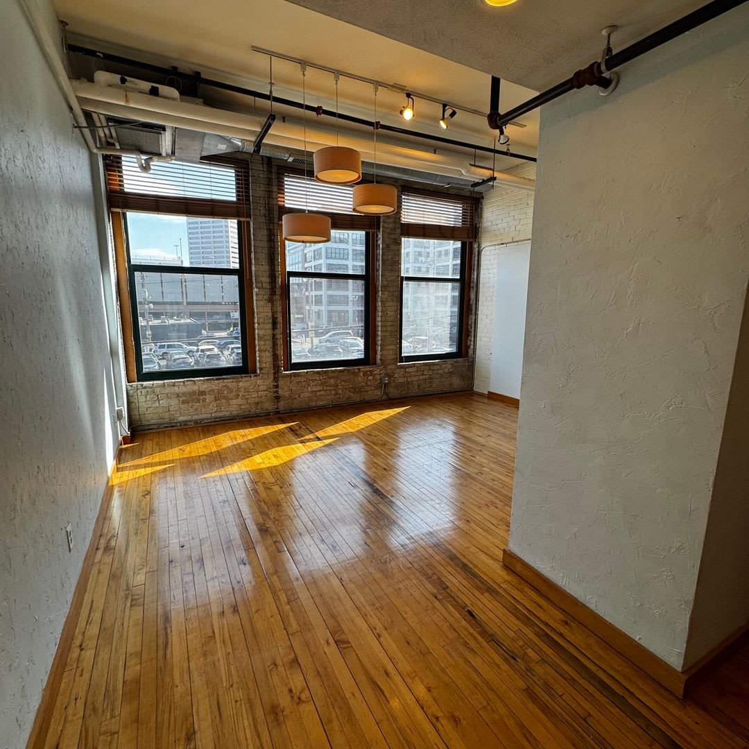 Spectacular industrial style studio, 1 full bath 466 sq ft condo in desirable Downtown St Paul!