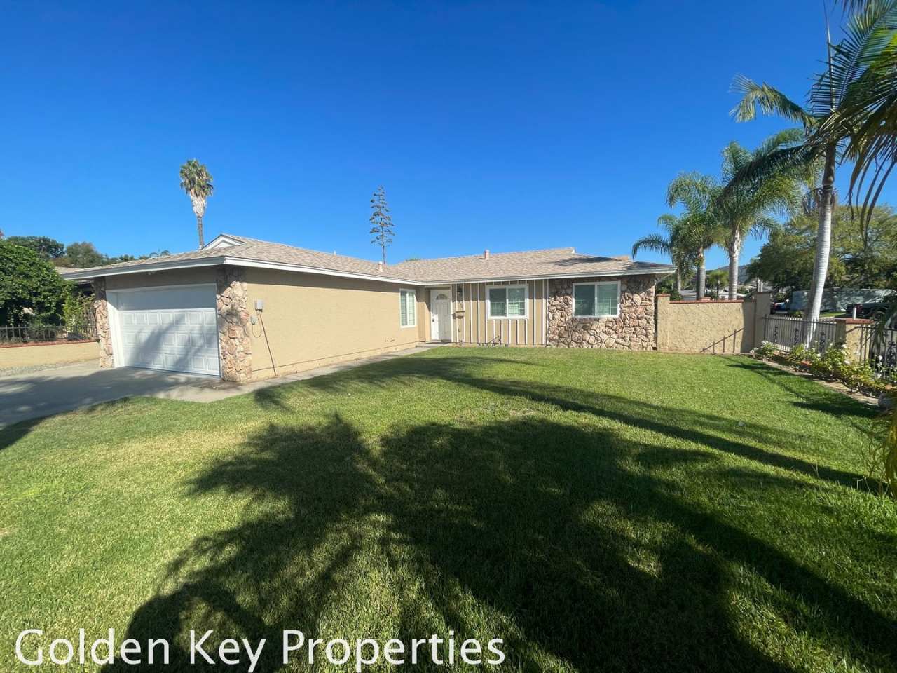 Nicely renovated corner property with a pool!