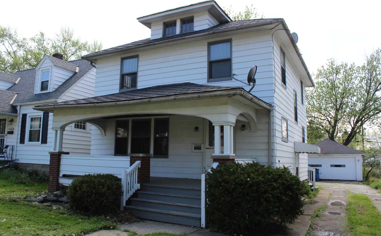 Classic 3-Bedroom Colonial: Hardwood Floors, Fireplace, and Detached Garage!