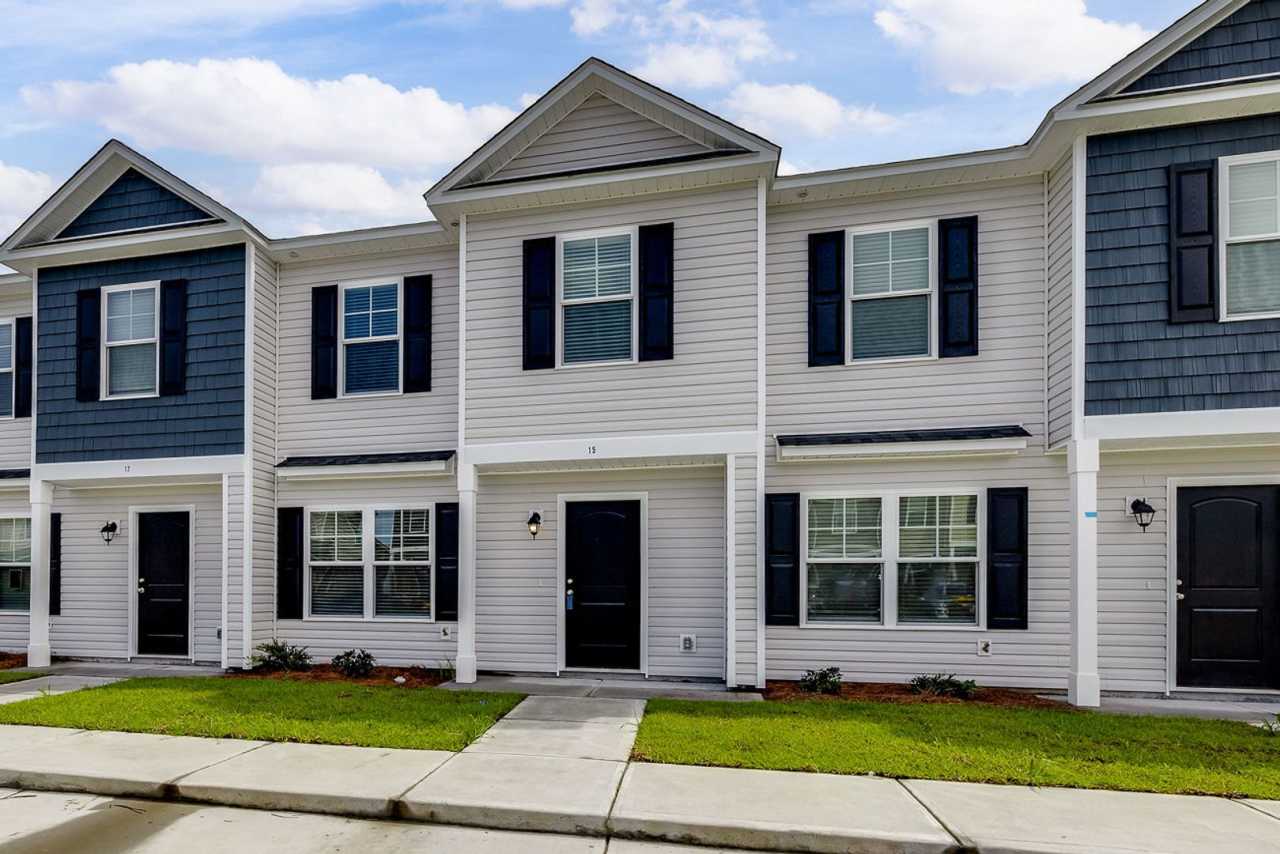 Open-Concept 3BED 2.5 BATH Townhome with Lawn Care Included!