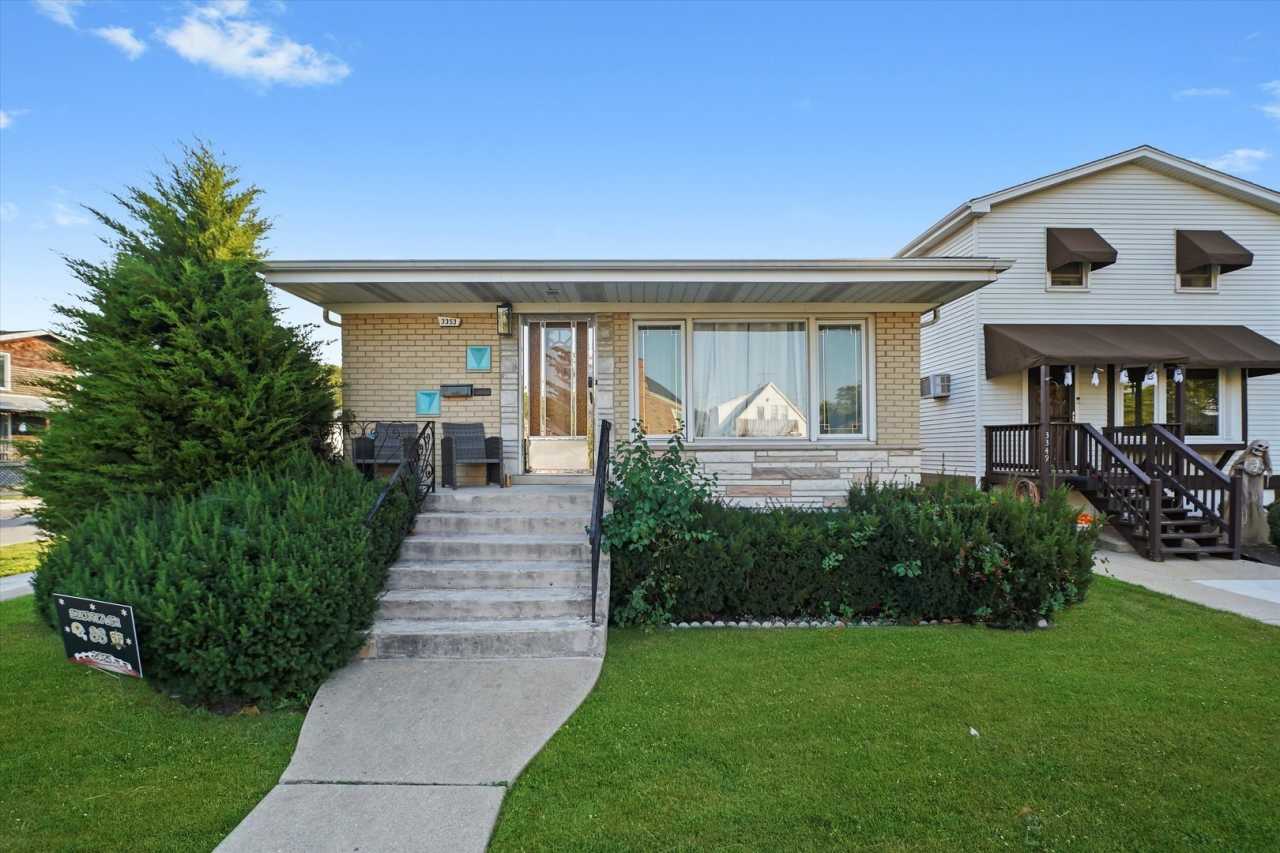 3353 N Ozanam Avenue