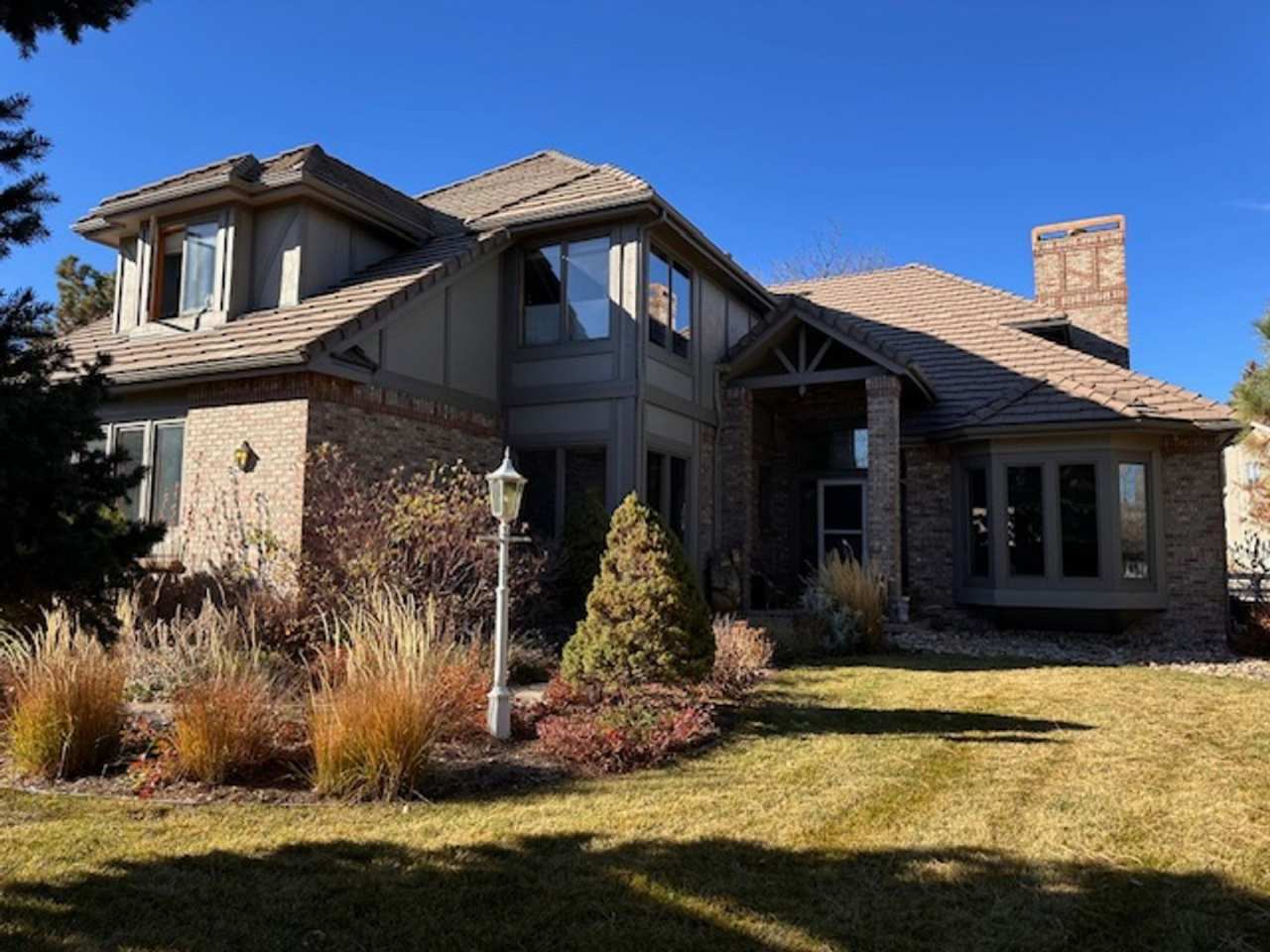 Wonderful, Sun-Filled 4-Bed 5-Bath Home on Enclosed Double-Lot on Coal Creek Golf Course in Louisville