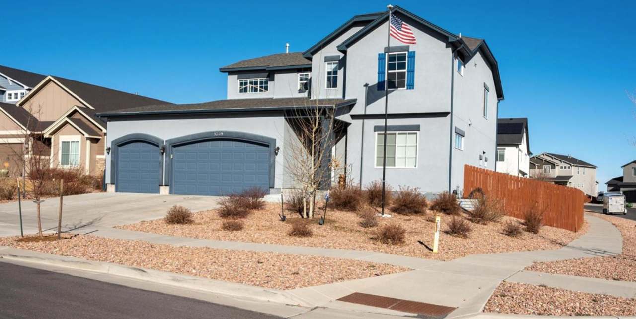 Luxury 6-Bedroom Corner-Lot Home with 5-Car Garage  Expansive Living Spaces