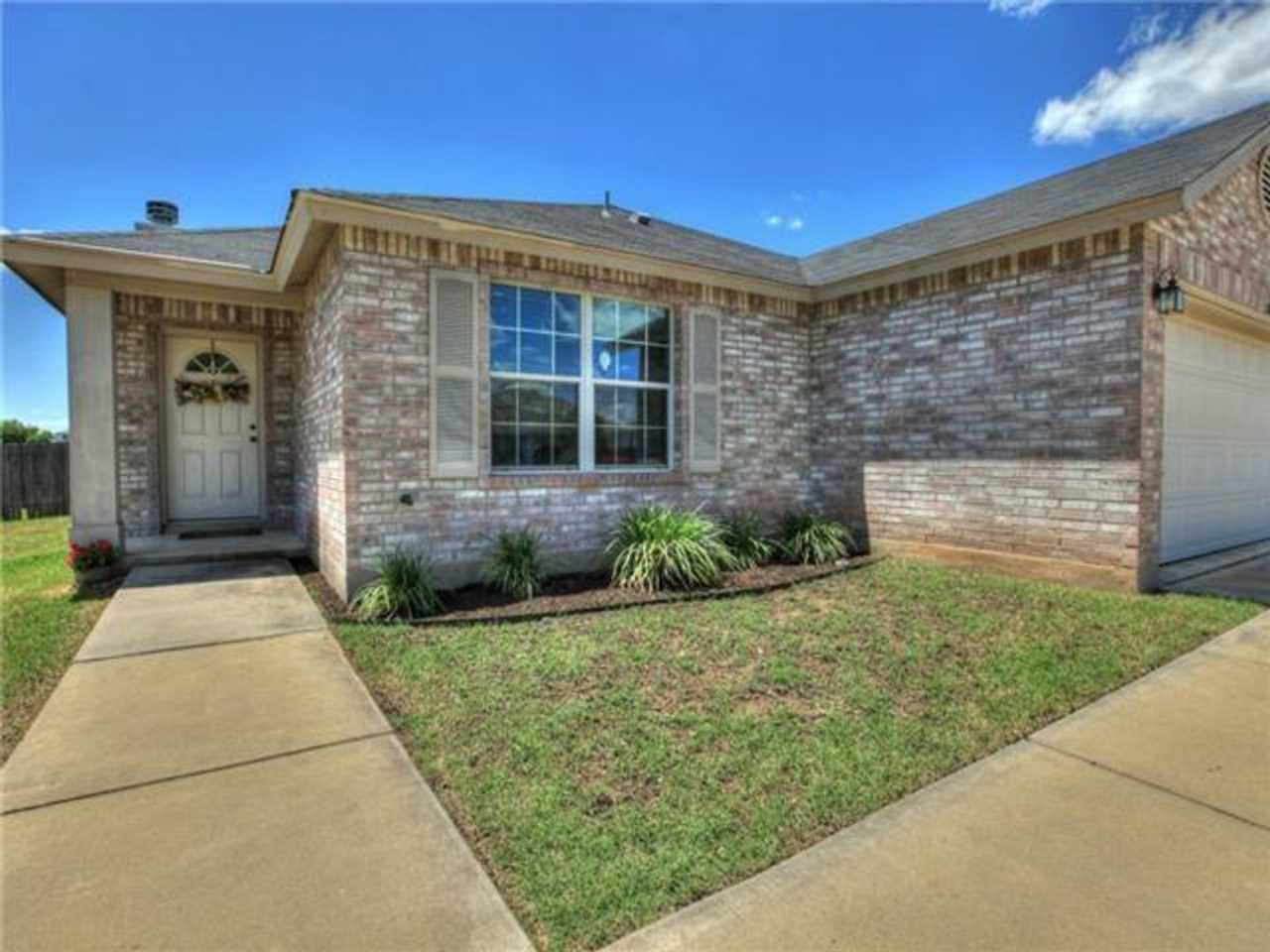 Fantastic open-concept home situated on a large lot with designer color selections throughout!