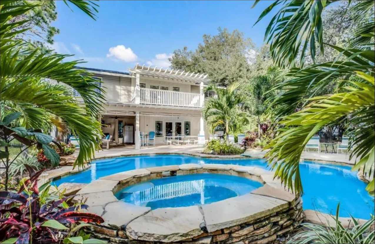 Furnished home on Palma Sola Bay with dock and pool