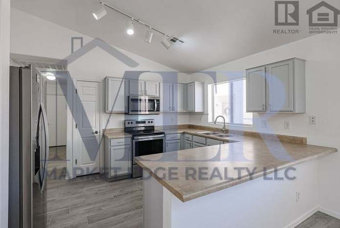 23928 West Desert Bloom Street