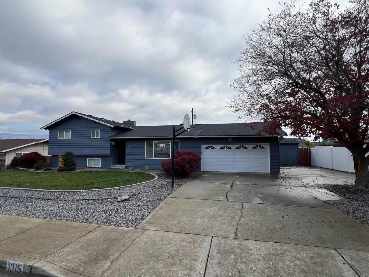 SPACIOUS 4 bed/2 bath home in desired location with double garage, fenced back yard!