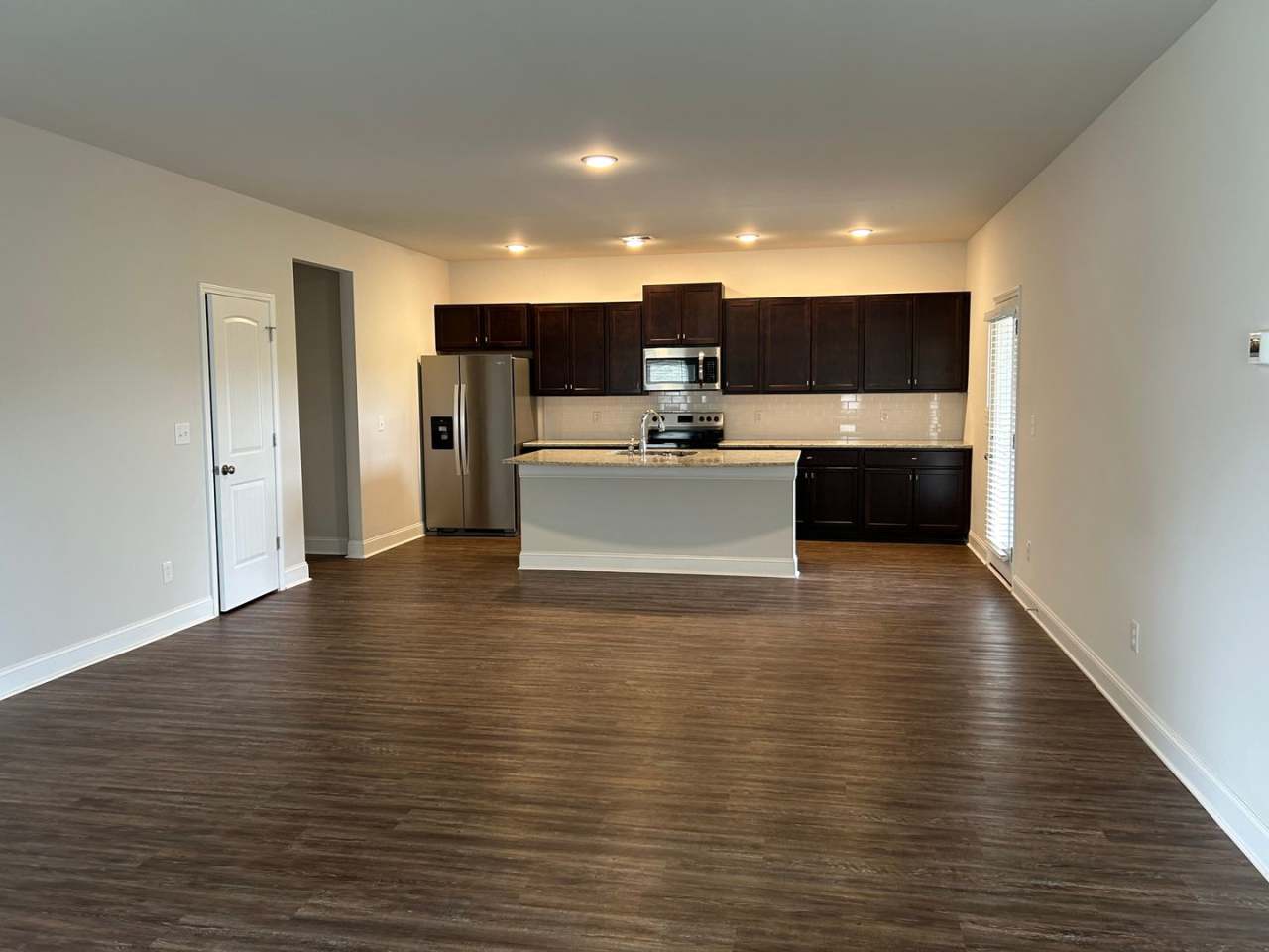 Three car garage Two story home close to everything