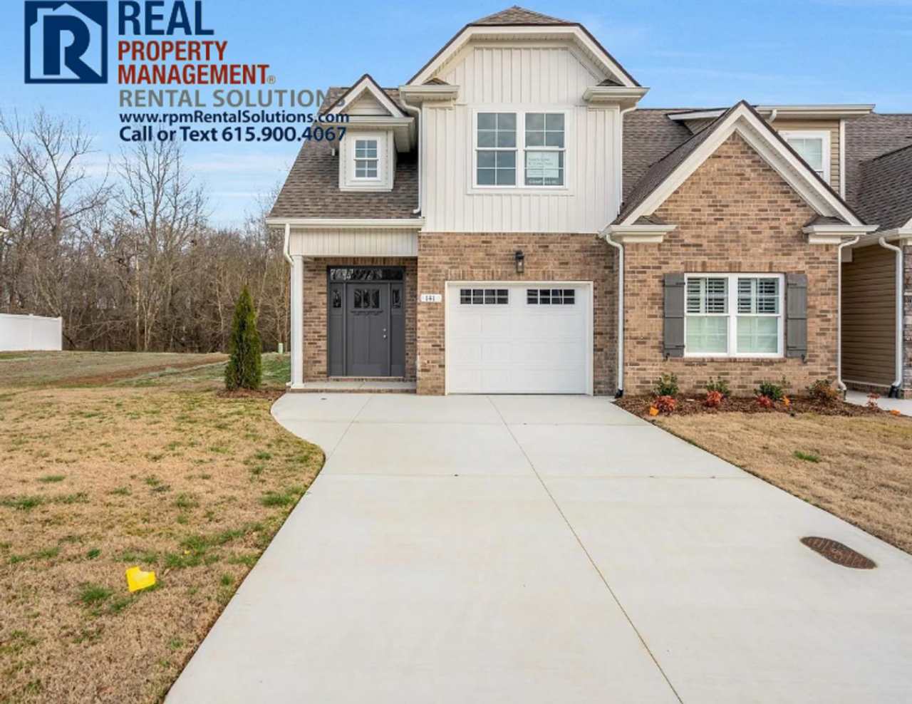 Modern end unit townhome in Manchester with attached garage!