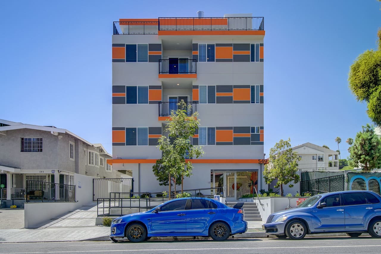 Welcome to 549 N Heliotrope Drive — modern living elevated in the heart of Hollywood.