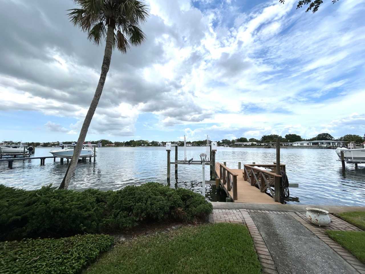 Classic waterfront Snell Isle Estates 3 Bed 2.5 Bath Home with private dock!