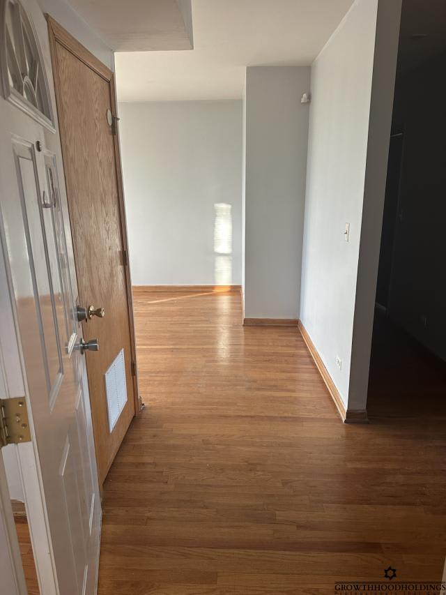 7933 South Langley Ave.