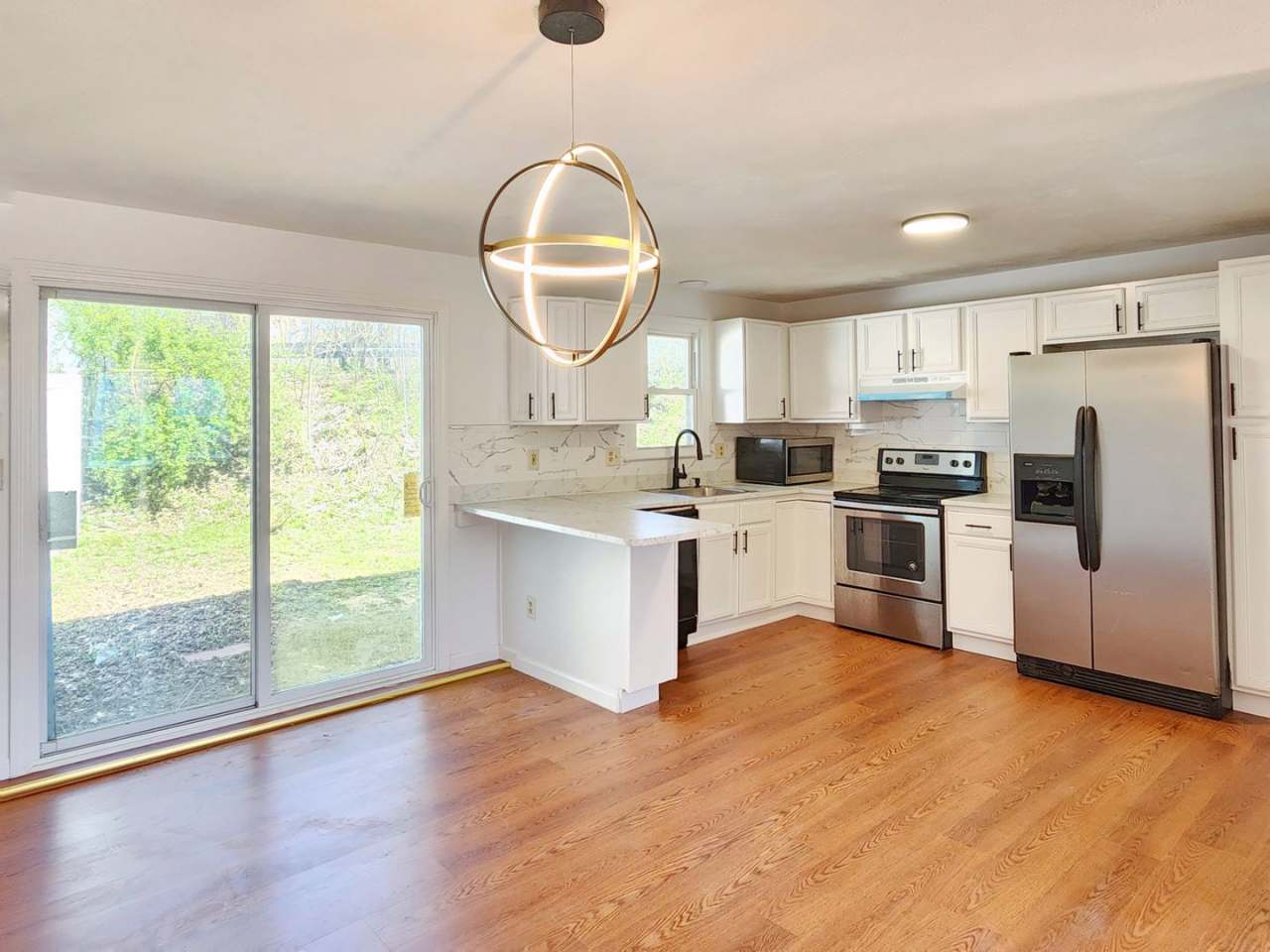 Beautifully remodeled townhouse with garage.