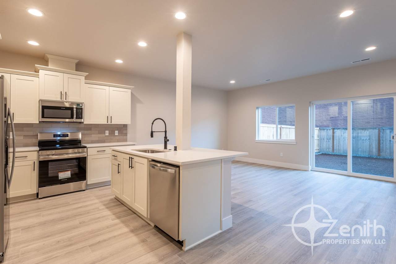 Brand New 3 Bedroom Townhouse in Vancouver! Low-Maintenance Fully Fenced Backyard! Conveniently Located Right off Padden Parkway! Available Soon!