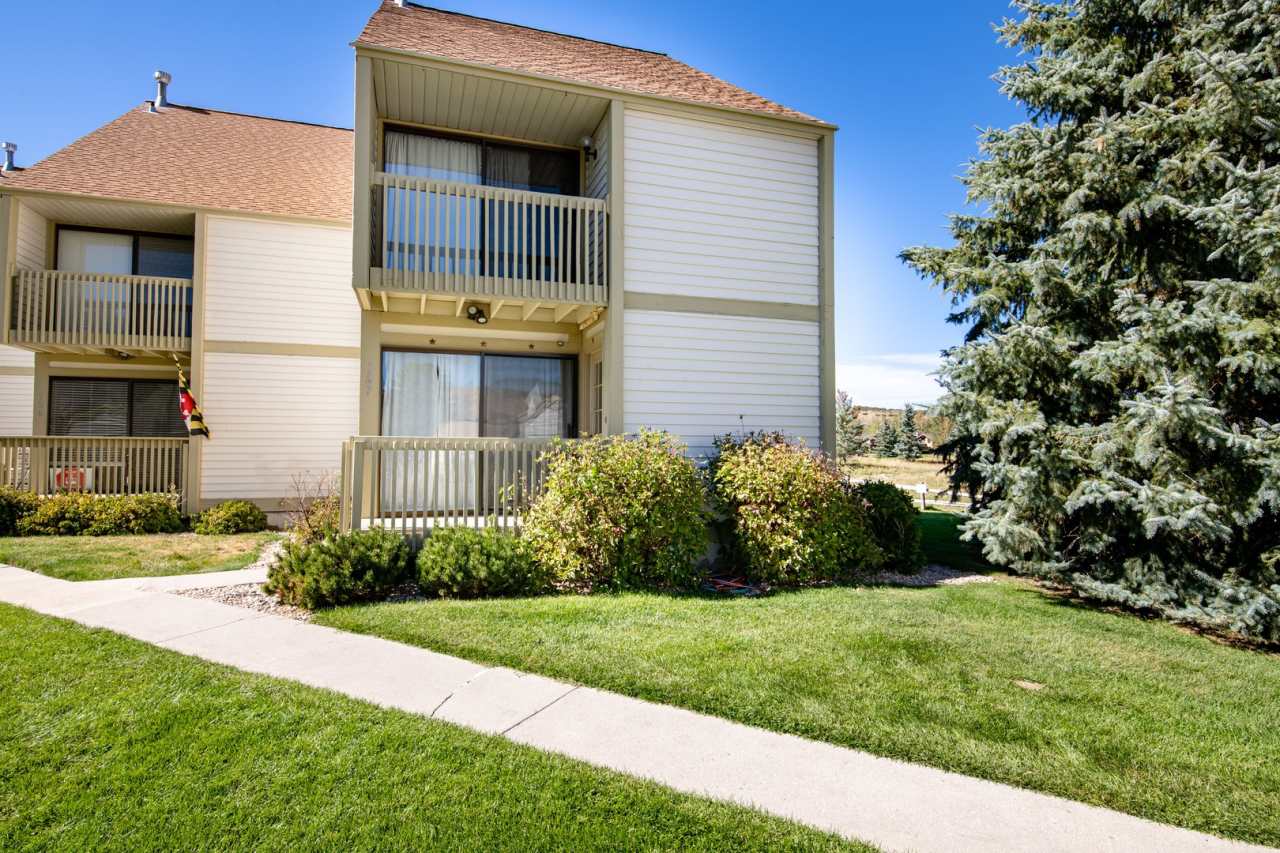 Conveniently Located Racquet Club Condo