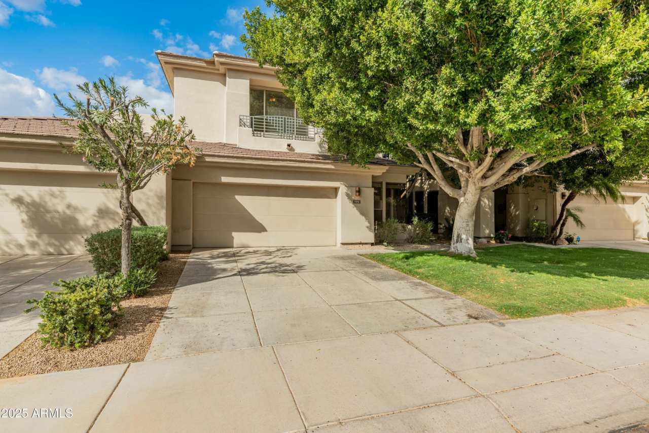 7310 E WOODSAGE Lane