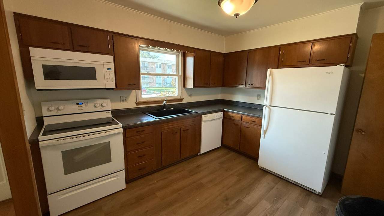 North central Ames 2 bedroom updated duplex, hardwood floors, and garage