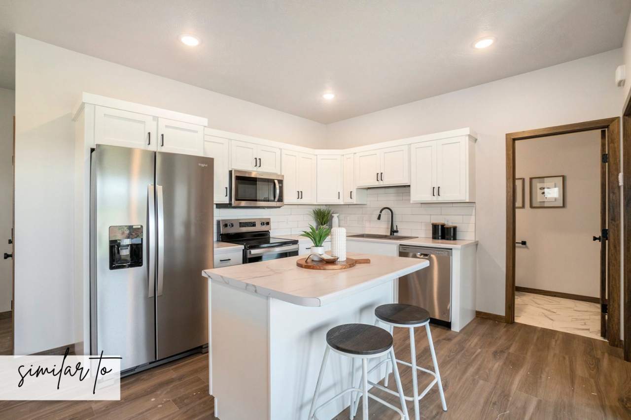 Charming 3-Bedroom Home with Spacious Kitchen and Master Suite in Southeast Sioux Falls!