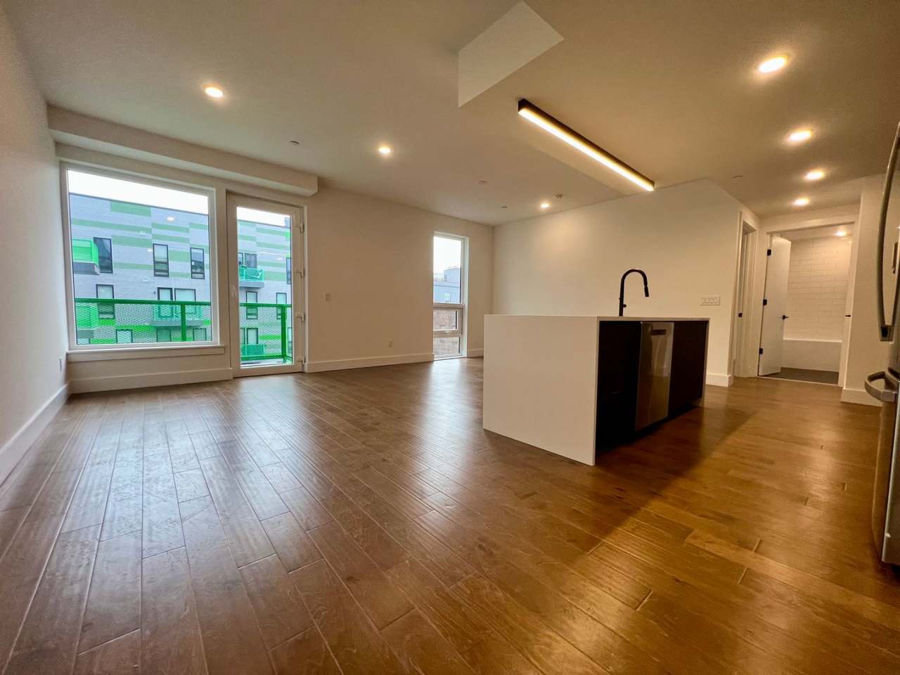 Stunning 2-Bed/2-Bath Condo with One-Car Garage and Rooftop Deck! Available NOW!