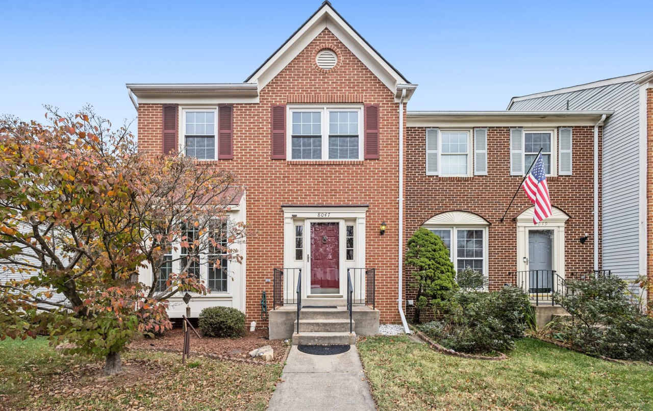 Modern Brick End-Unit Townhome with Stunning Upgrades and Serene Wooded Views