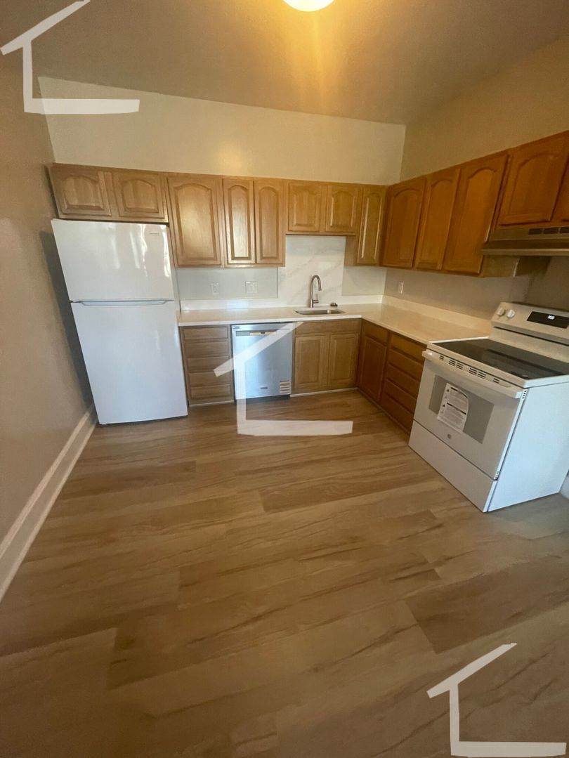 Newly renovated 2 bed near the heart of Washington Square in Brookline!