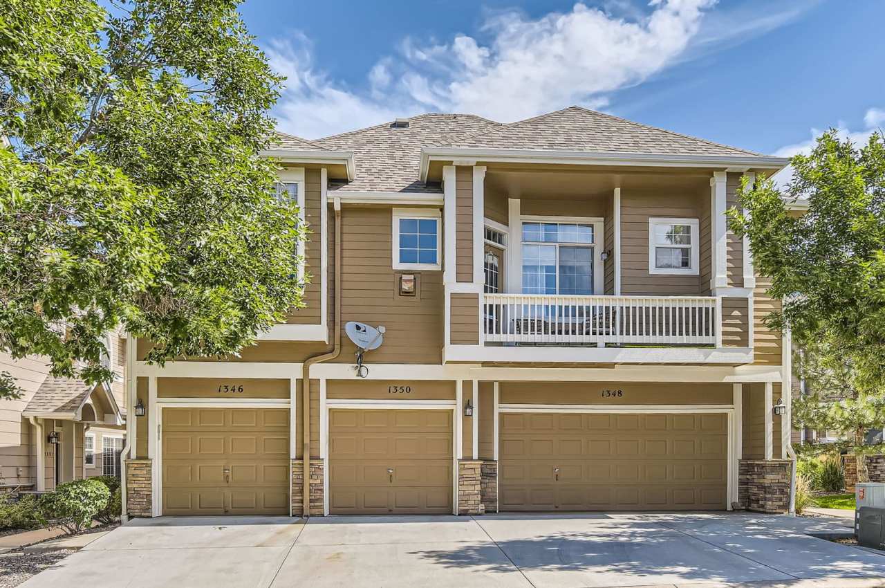 Evolve Real Estate: Spacious 2 Bedroom + Loft Townhome with Attached Garage and Back Yard. Available July 1.