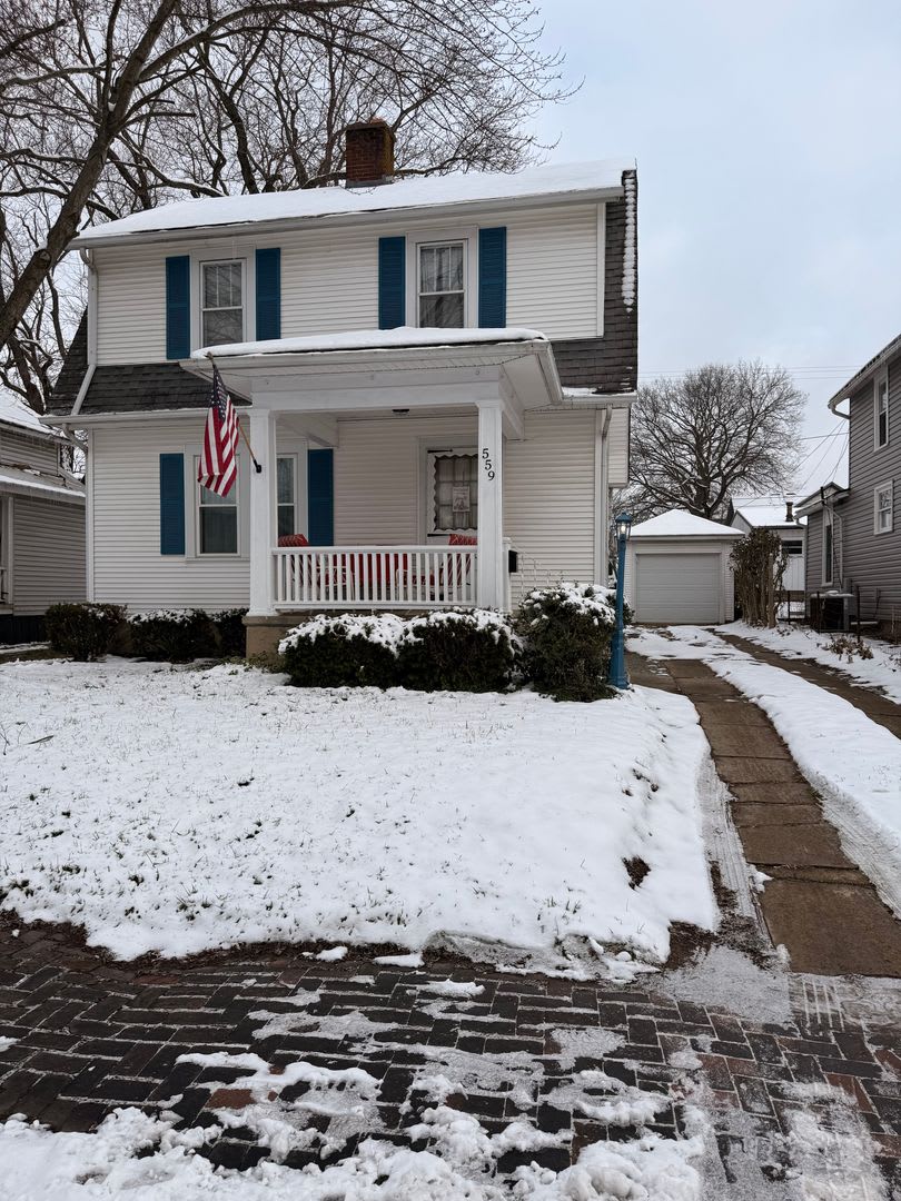 3 Bedroom 2 1/2 Bathroom with one car detached garage