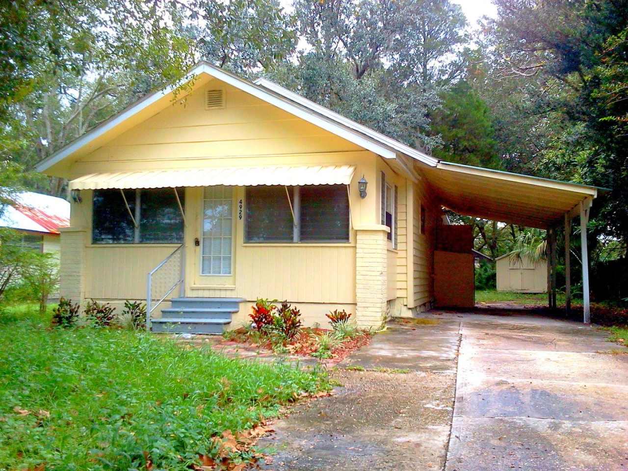 Cute 2BR/1BA Home w/Carport, Sun Room, Large Backyard,  Detached Utility Shed