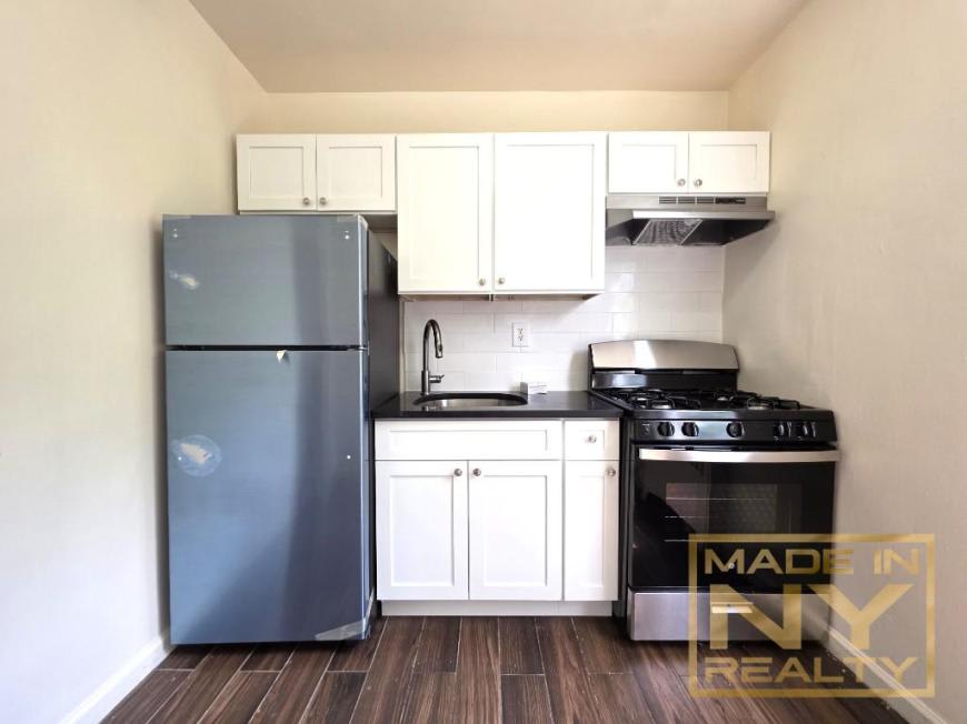 36-21 213th St