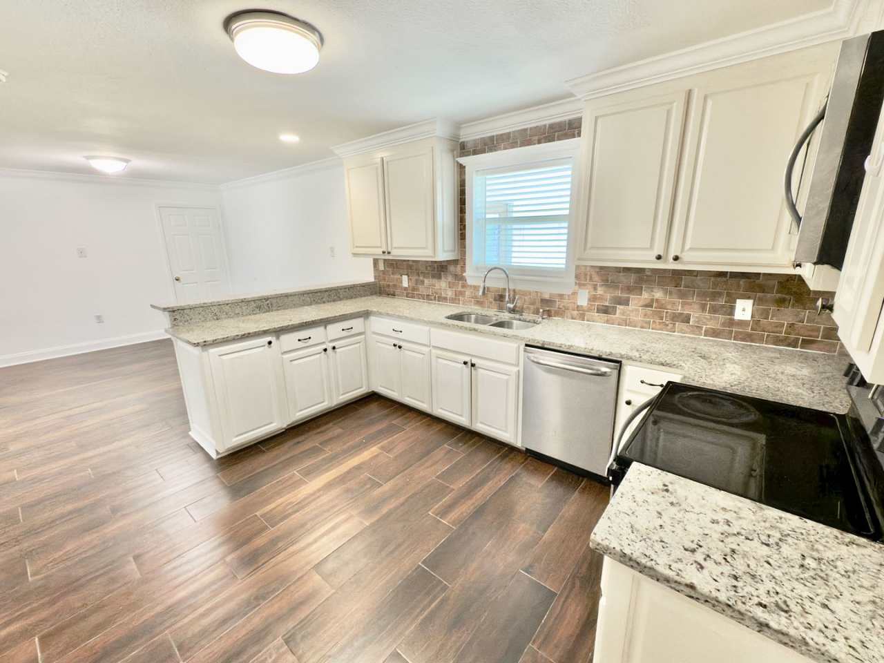 Spacious 4BR/3BA Brick Home with Bonus Mother-in-Law Suite on Geraldine Dr!