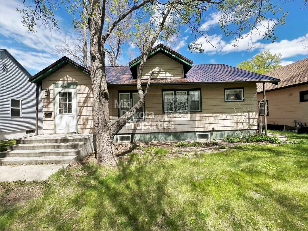 414 W 11th- 4 bedroom house with a garage