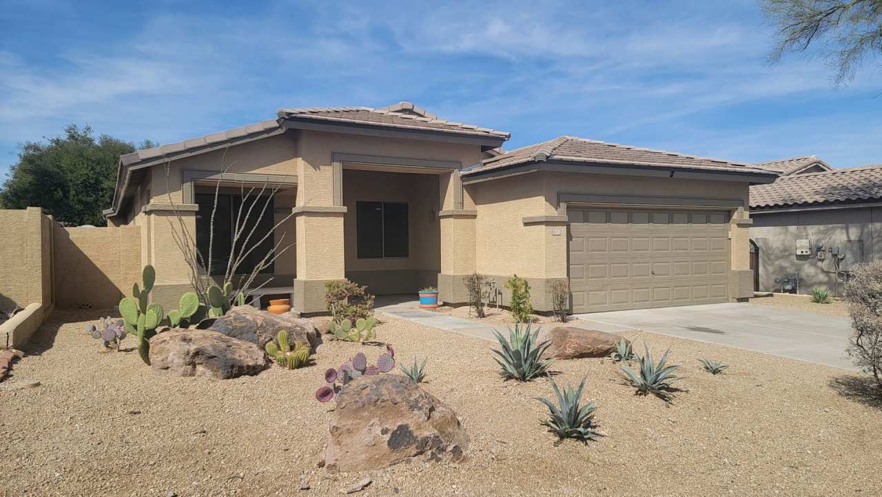 SOLAR  NEW CARPET makes this home a BARGAIN! Estrella Mtn Ranch amenities!