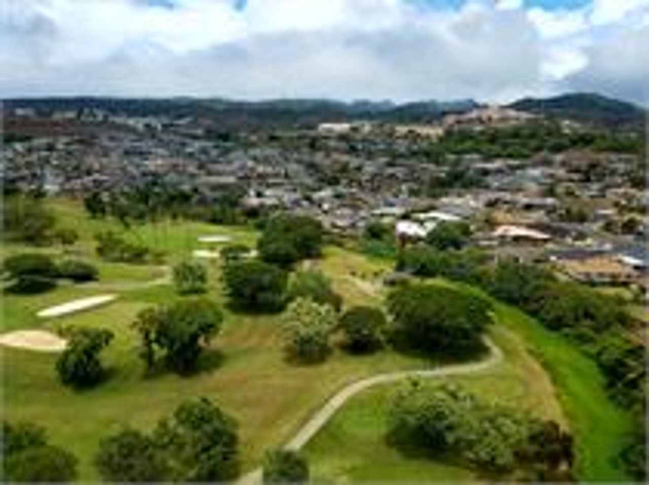 Beautiful golf course views from this Salt Lake - Moanalua condo!