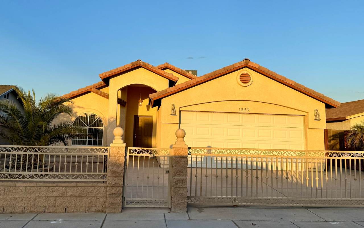 Enjoy this Fully Fenced San Luis Home