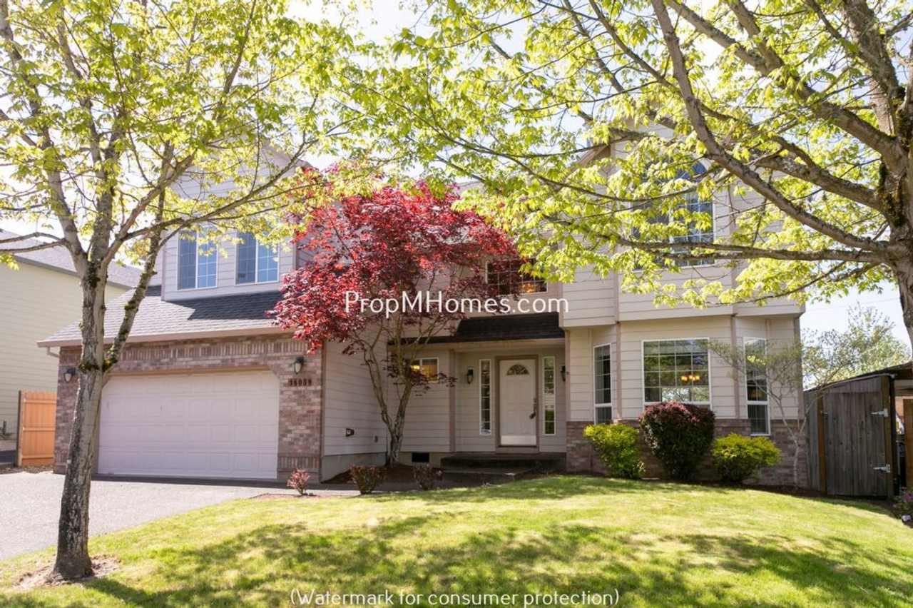 Charming Four Bedroom Bethany Home w/ Fully Fenced Back Yard!