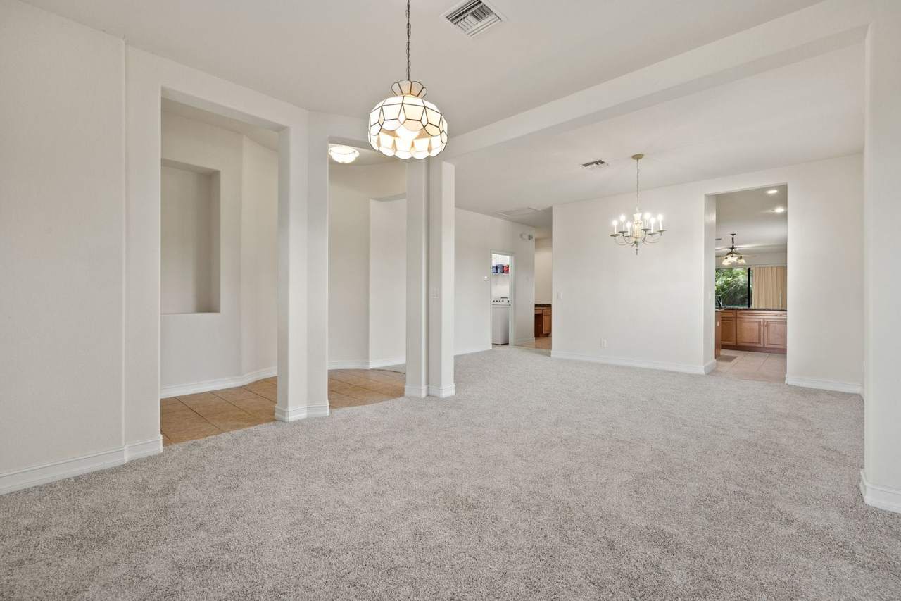 3 bedroom 2 Bath with oversized Lanai and large backyard. 3 car garage