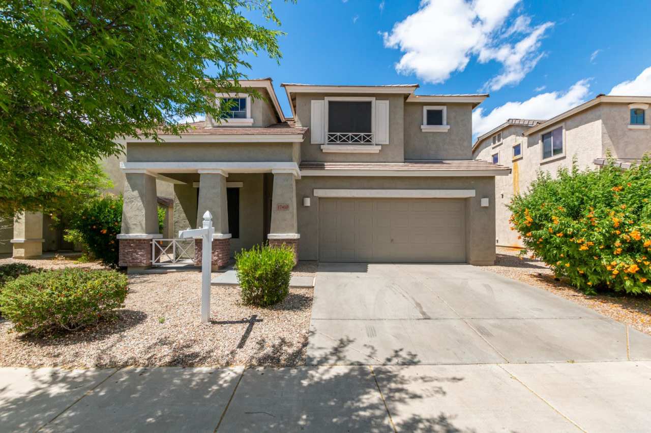 Welcome home to this stunning Surprise home with 4 beds and 2.5 baths!