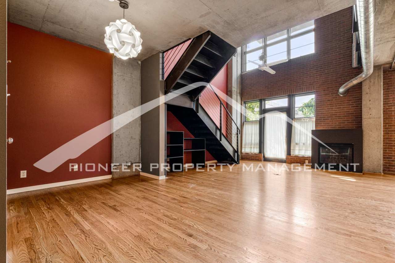 Modern Industrial Condo Downtown with Parking!