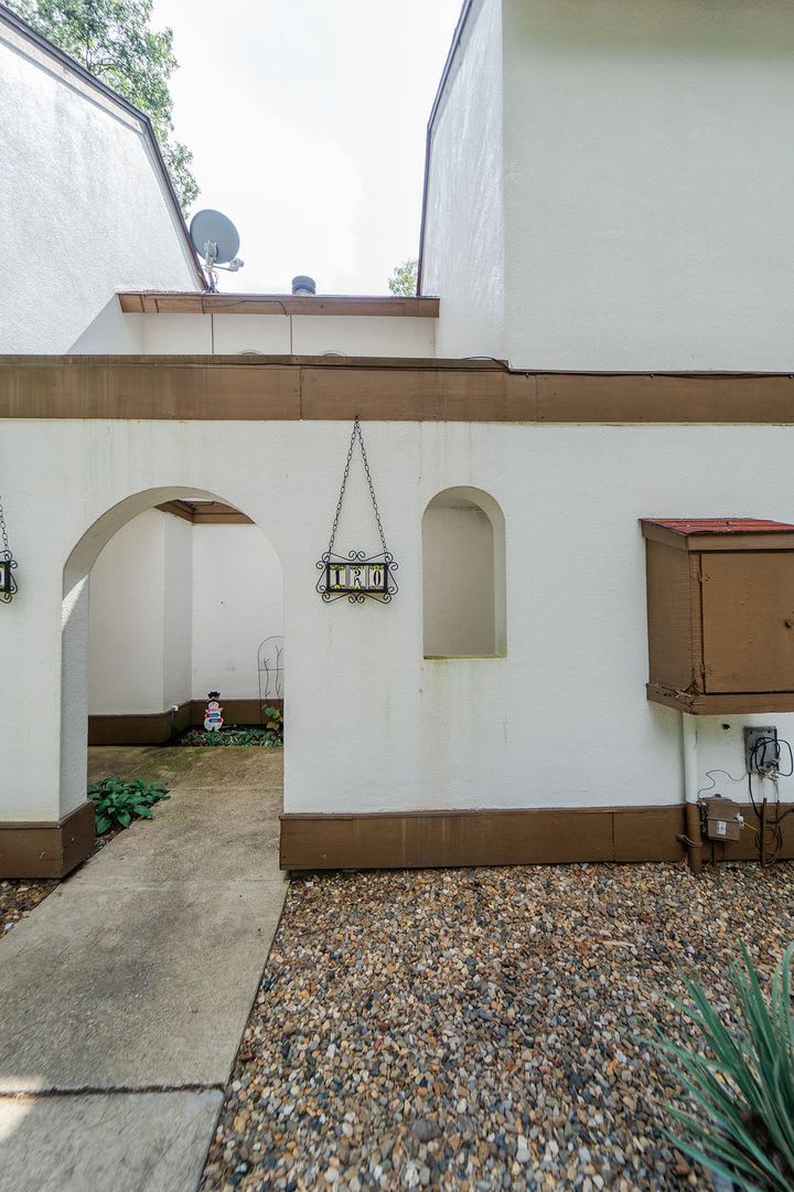 Located near the west gate of Hot Spring Village, this is a charming townhome with 3 Bedrooms, 1.5 Bath, with a fenced outdoor space that looks on the common space.